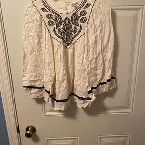 White and black cut out shirt